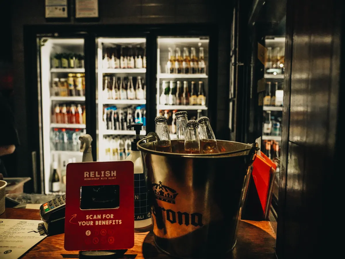 Glass door beverage coolers in a bar